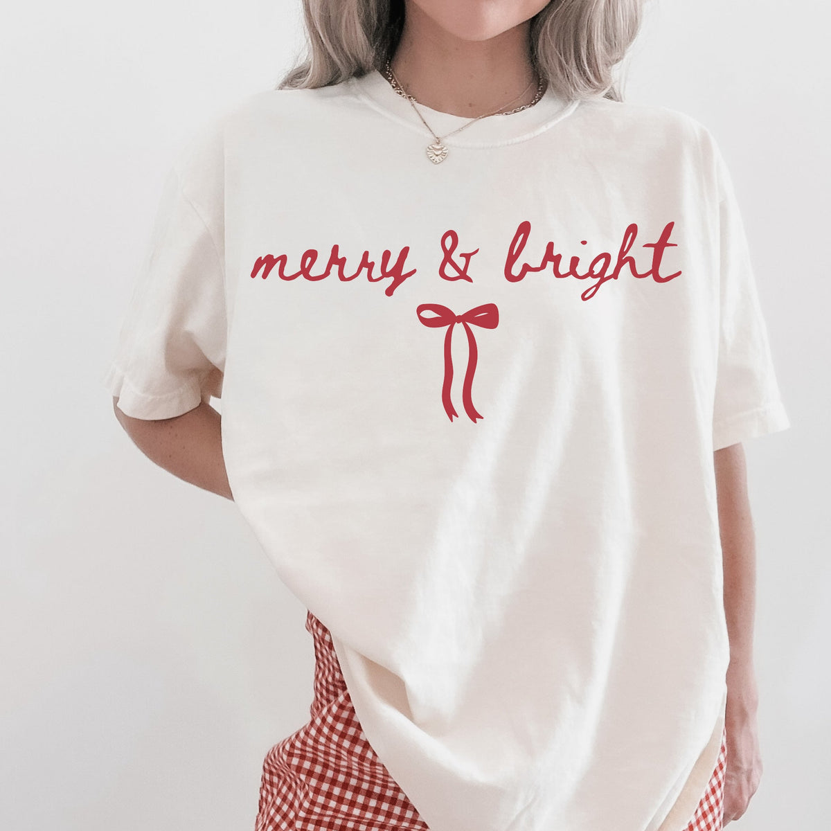 Merry and bright Christmas t shirt with red ribbon bow in ivory